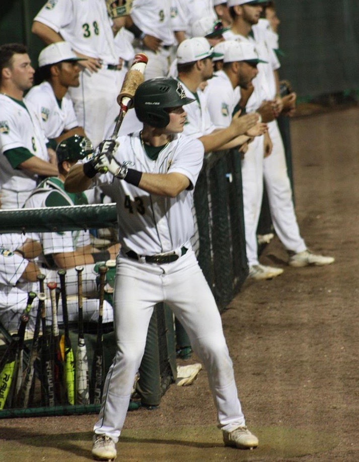 A photo of Corey Mumaw warming up with a bat when he played for the Saint Leo University Lions baseball team